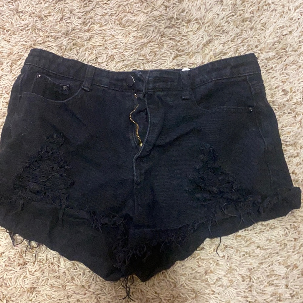 black ripped jean shorts